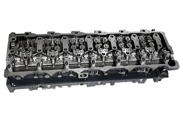 Engine cylinder head with exposed valve train