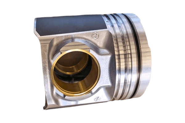 Single engine piston showing the skirt, pin bore and ring grooves