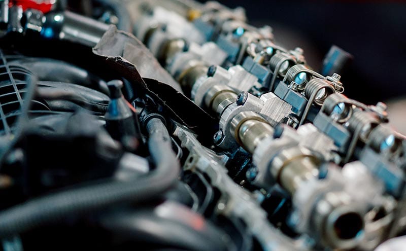 Close-up of engine components and fuel system connections